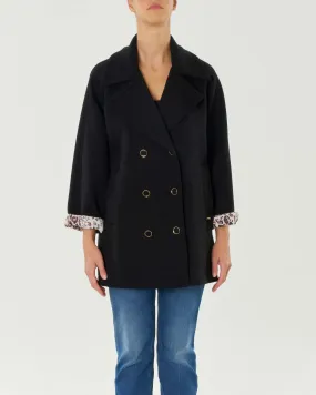 Caban doppiopetto nero in tessuto scuba con fodera a fantasia animalier e maniche raglan